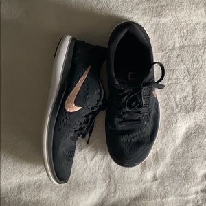 Black Nike running shoes